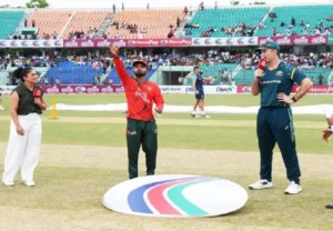 BAN and AUS toss